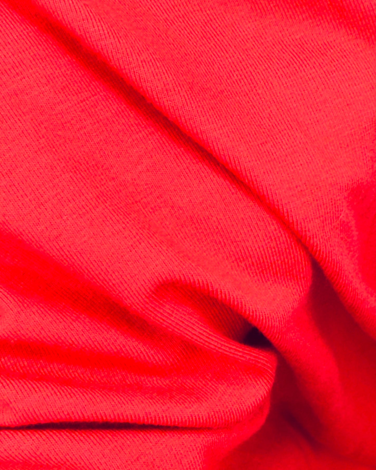 Close-up of red fabric with visible texture